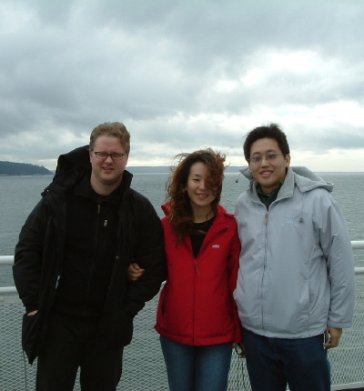 Muskie McKay, Anni Cao, and Andrew Kuo on a ferry